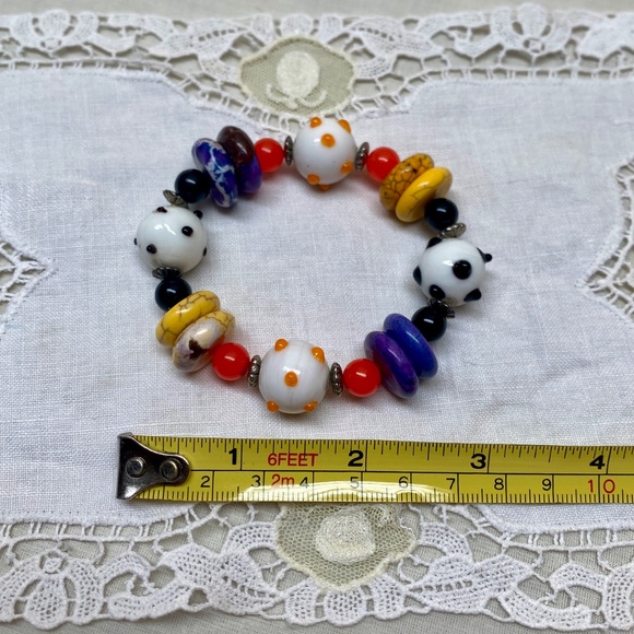 Multi Colored Festive Glass Beaded Stretch Bracelet With Silver Bead Spacers - Picture 8 of 9